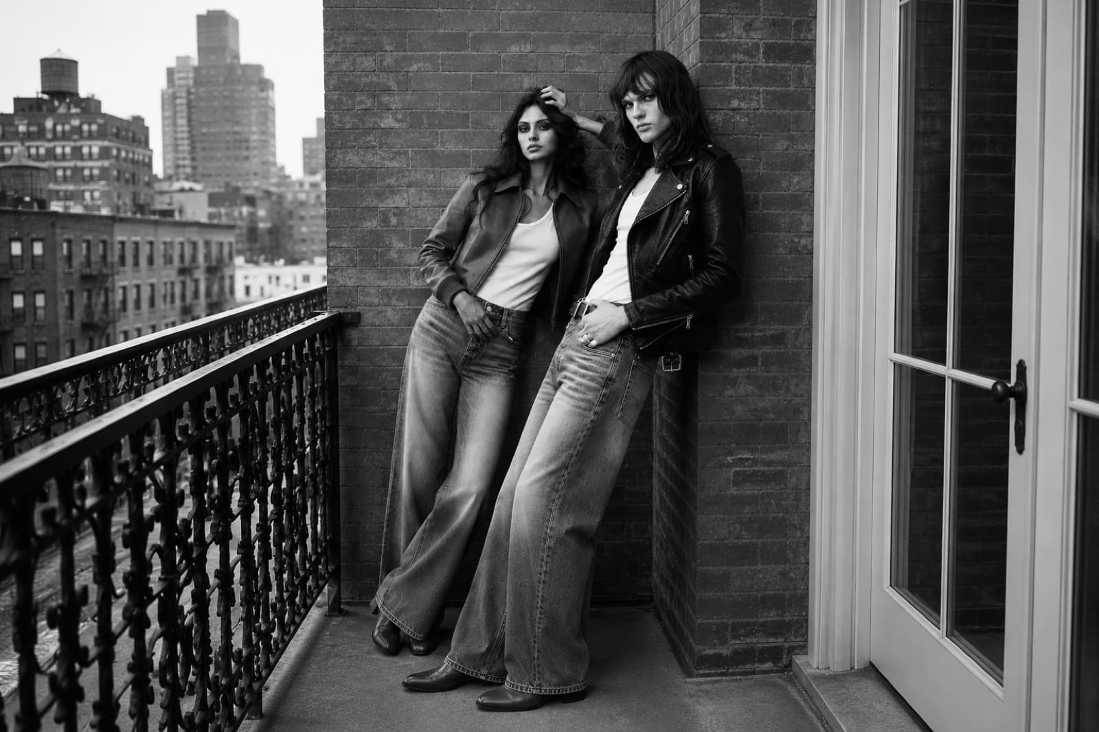 BAGGATTI PARIS lookbook image from the live storefront: a wide editorial campaign photograph of models in leather and denim